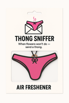 Thong Sniffer car air freshener on a backing card reading When flowers will not do, send a thong